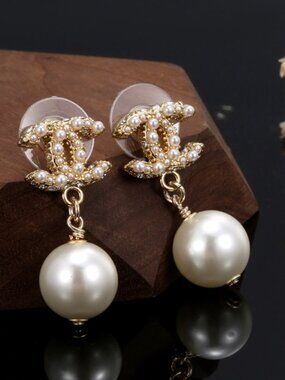 Authentic Chanel pearl pendant earrings